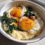 cheesy grits with spinach and fried eggs