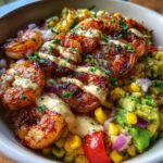 yummy grilled shrimp bowl with avocado corn salsa and creamy sauce