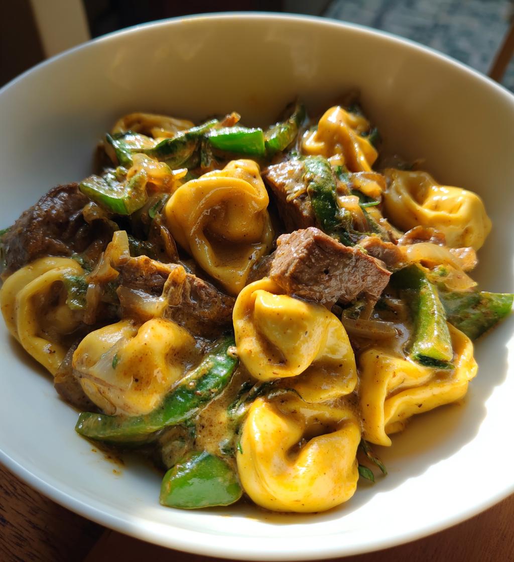 cheesesteak tortellini in rich provolone sauce - detail 1