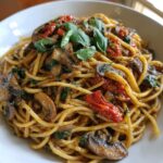 sun dried tomato and mushroom pasta in garlic and basil sauce